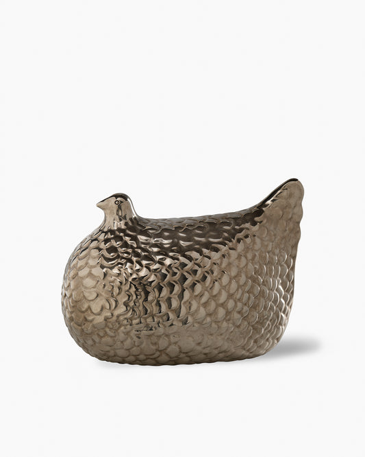 Hen-shaped figure.
